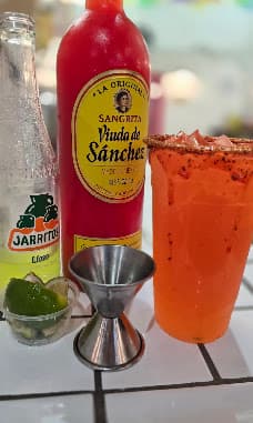 Chile-rimmed margarita with sangrita and a Jarritos on the side